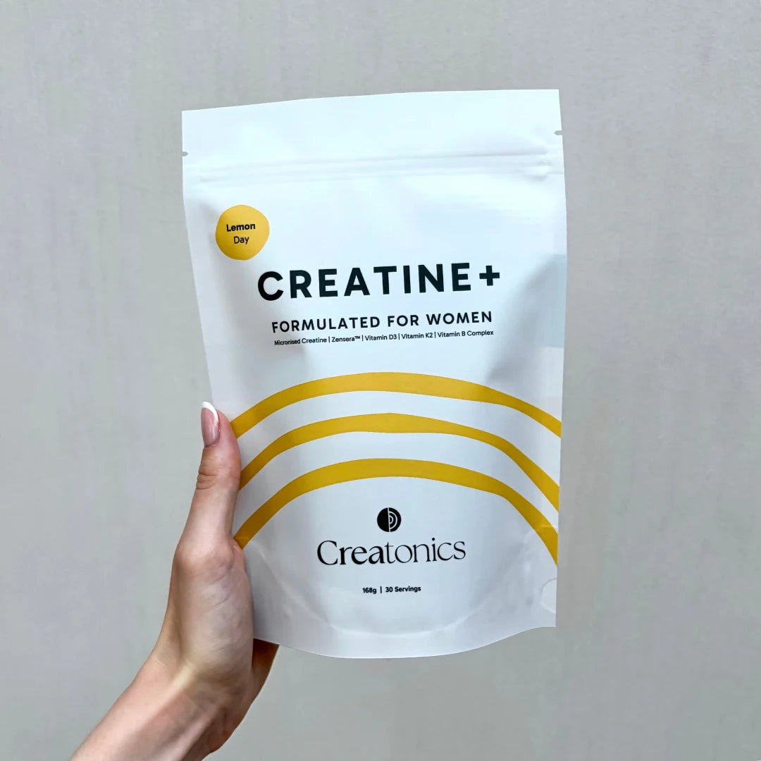 A high-quality product shot of the Creatonics Lemon Day creatine pouch, specifically formulated for women to support strength, mind, and energy during midlife.
