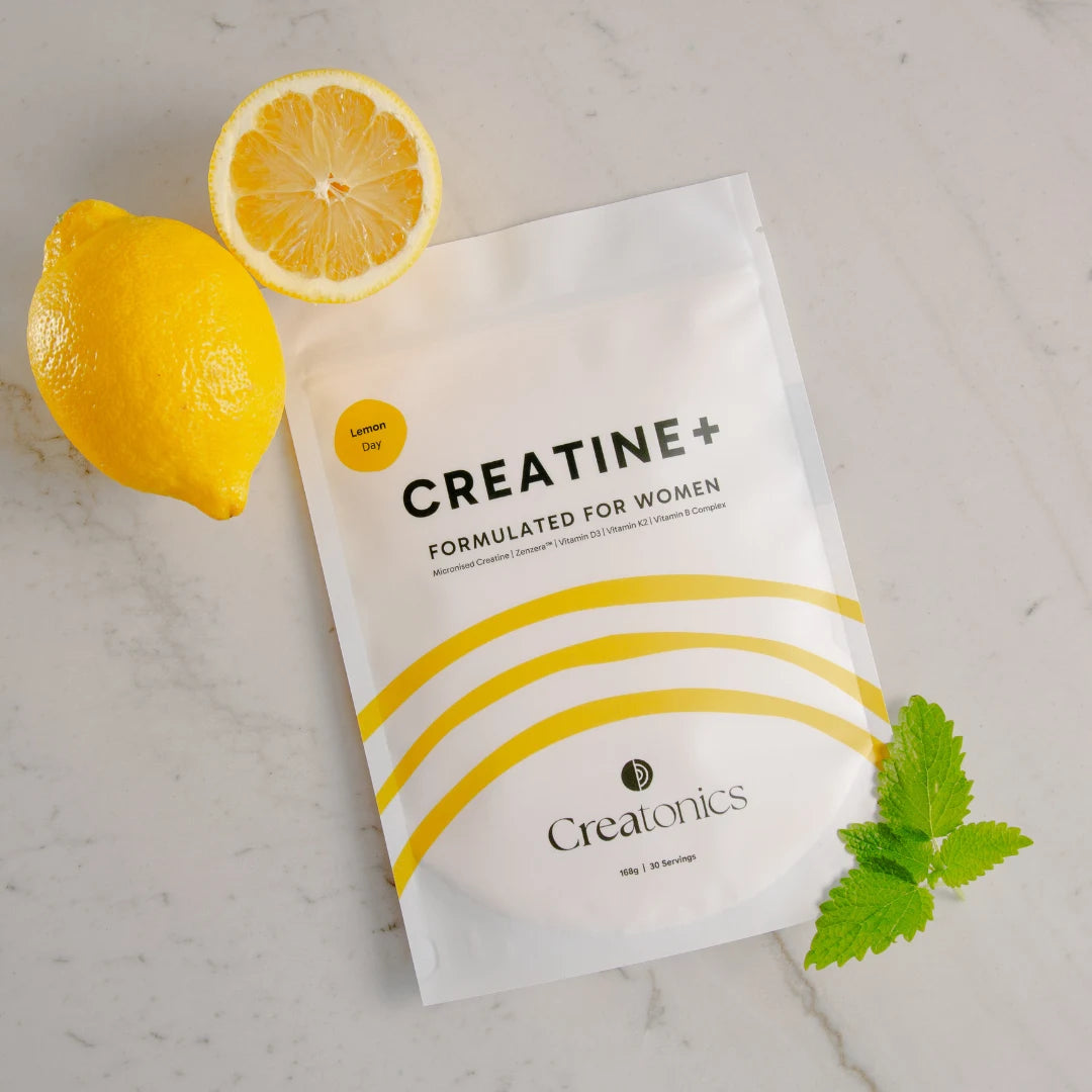 A high-quality product shot of the Creatonics Lemon Day creatine pouch, specifically formulated for women to support strength, mind, and energy during midlife.