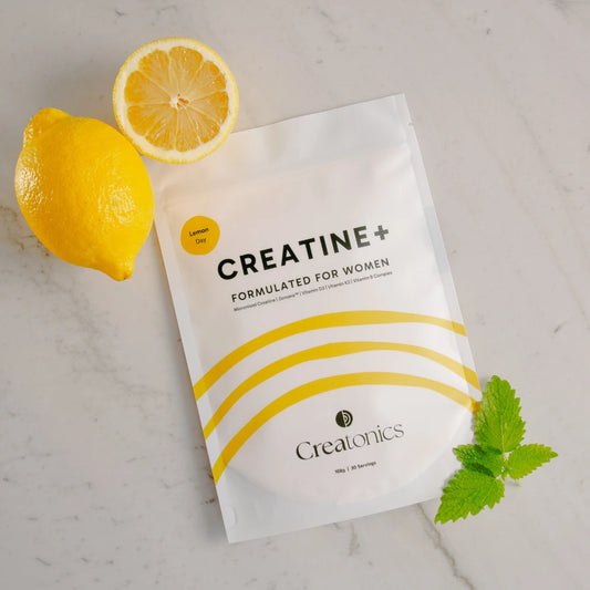 A high-quality product shot of the Creatonics Lemon Day creatine pouch, specifically formulated for women to support strength, mind, and energy during midlife.